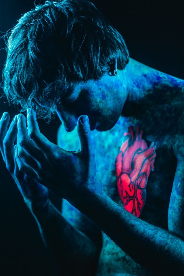 Man in pain with heart image