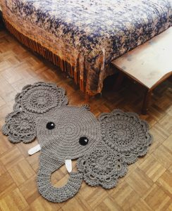 Elephant rug by bed